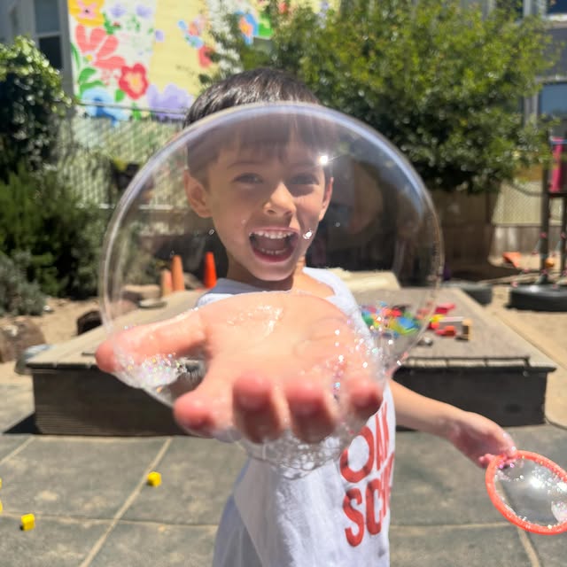 Summer is here! That means extra special yellow bus field trips out of the city, “water days,” and the return of our bel